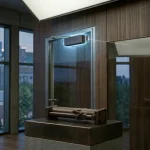 L'image est un ferme-porte coupe-feu, montrant son mécanisme de puissance hydraulique interne sur un piédestal au premier plan avec des lignes indicatrices étiquetant le réglage de la tension du ressort et la valve de vitesse de fermeture, tandis que l'unité métallique foncée entièrement assemblée est montée sur une porte vitrée à l'arrière-plan.